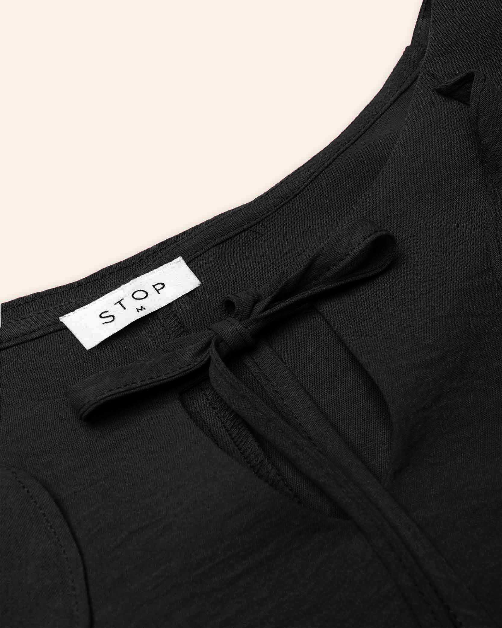 vestido-manga-larga-negro-olanes