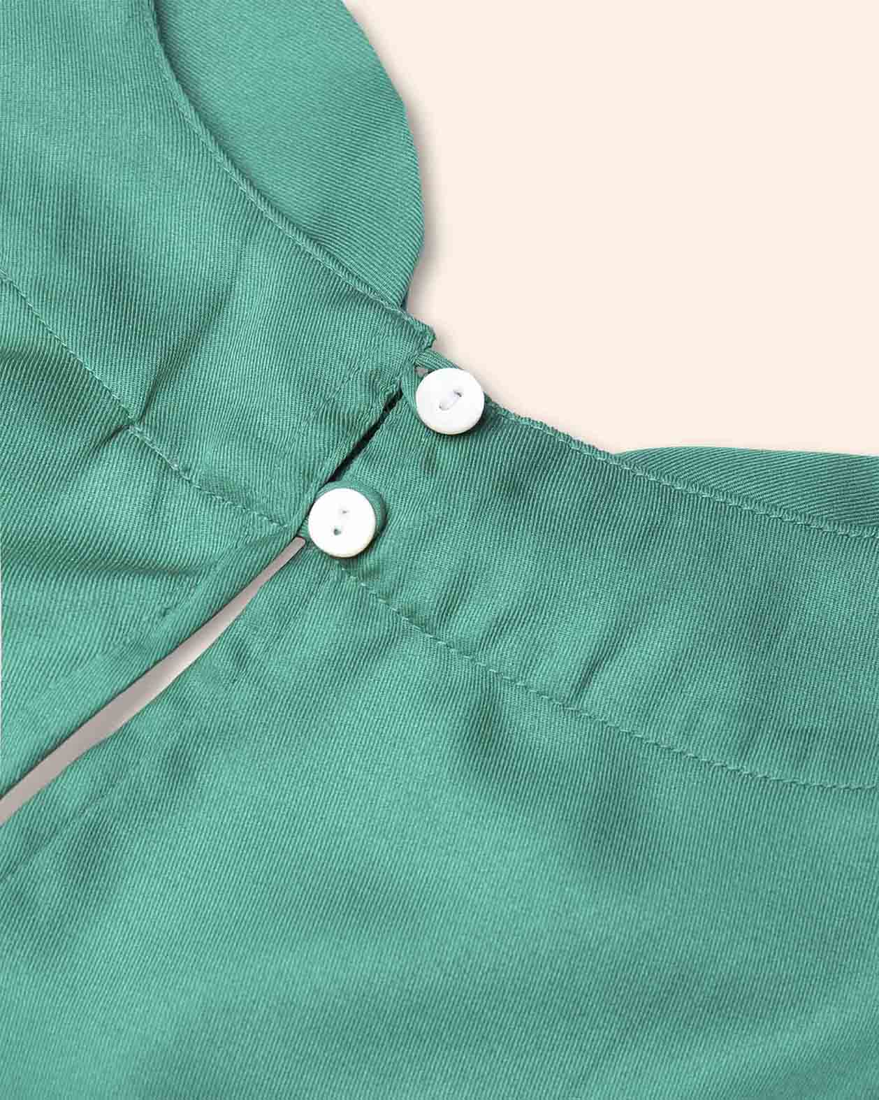 blusa‑verde‑con‑detalle‑en‑cuello‑STOP