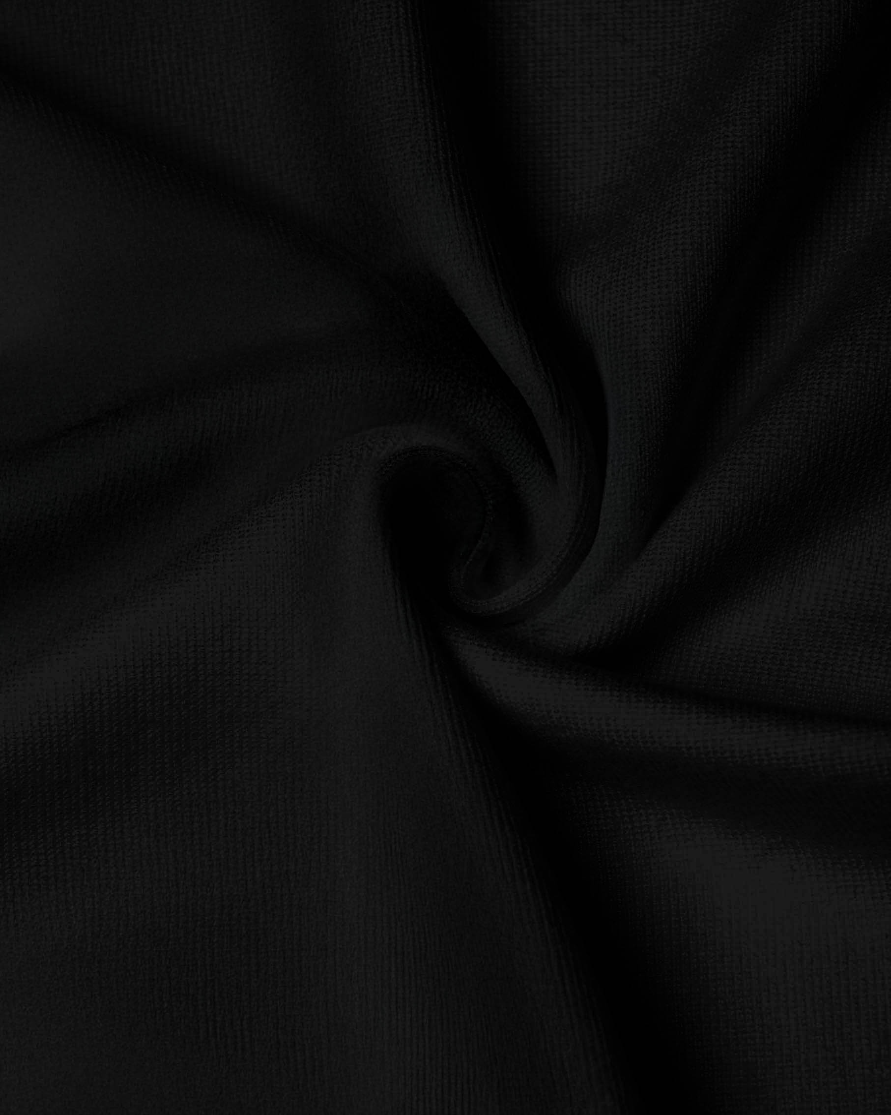bluson-de-punto-negro-aberturas-costados