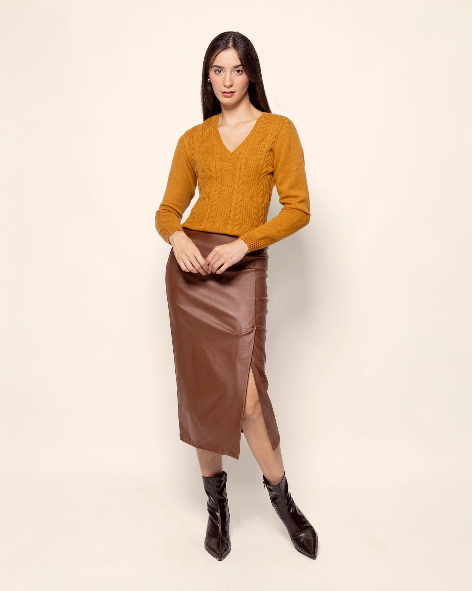 Suéter cuello V trenza ancha