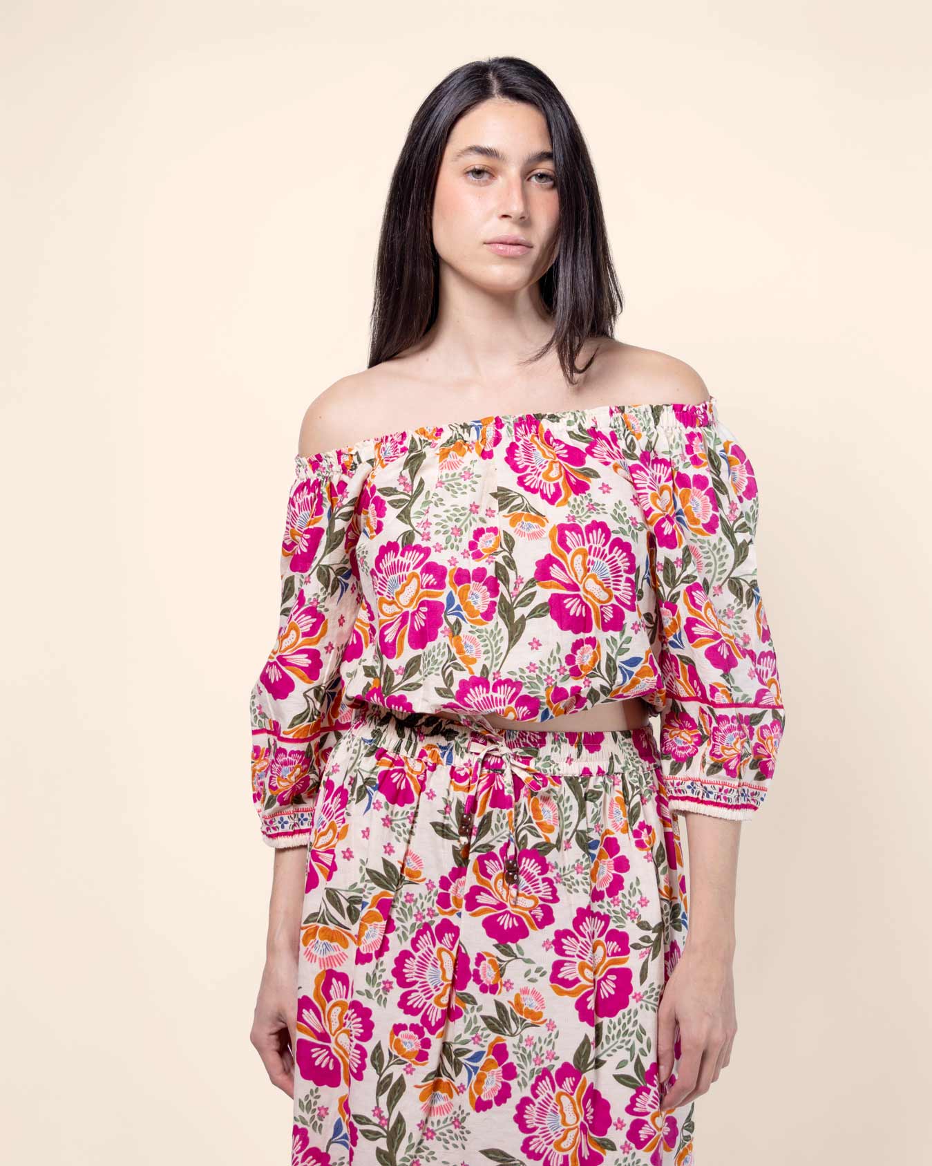 Blusa manga 3/4 estampado, elástico y textura