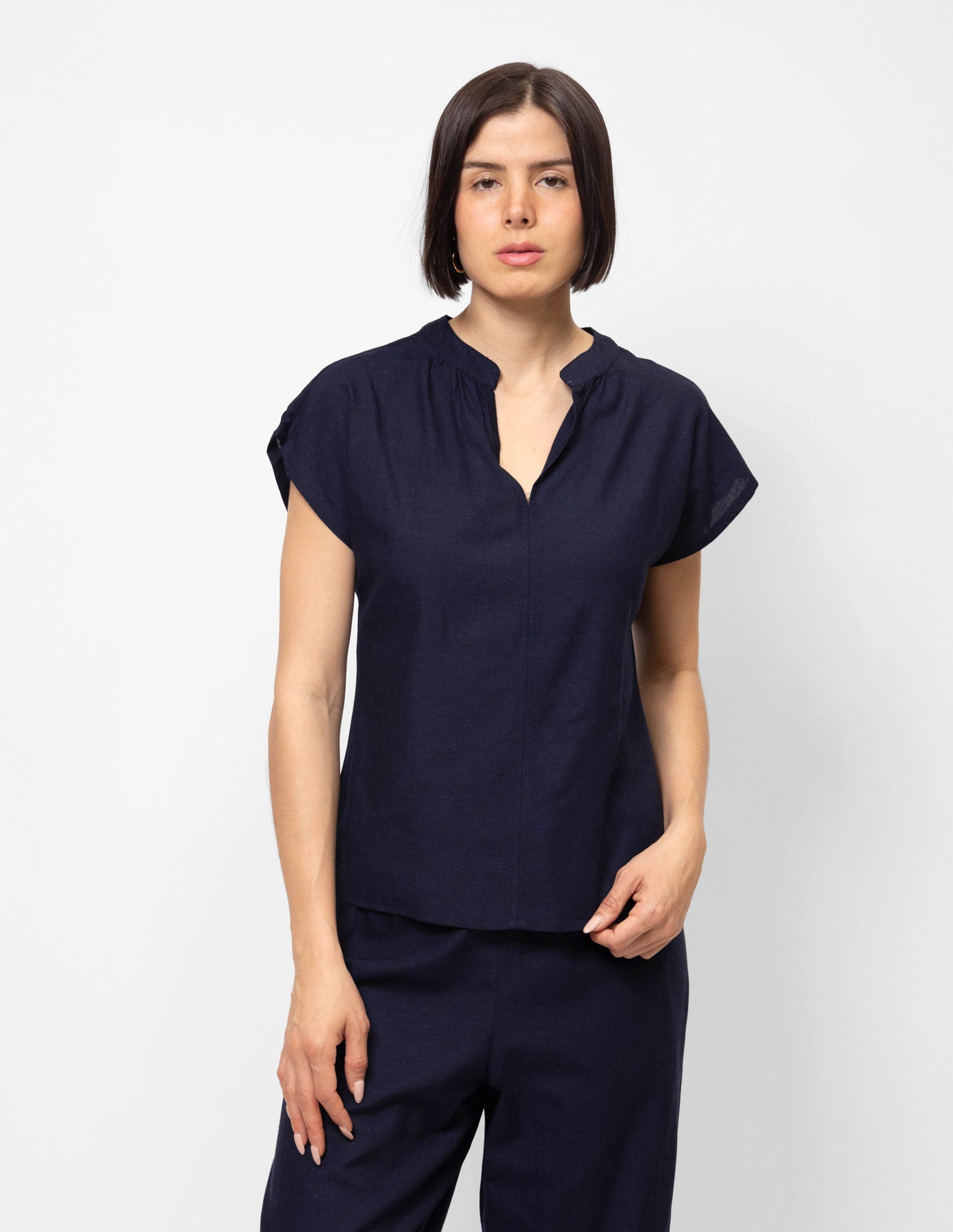 Blusa manga corta corrida efecto lino