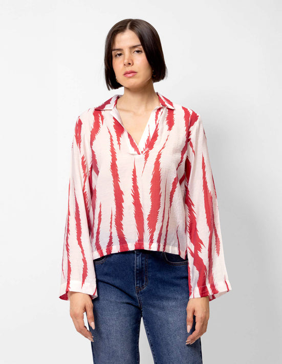 Blusa estampada manga larga media aletilla