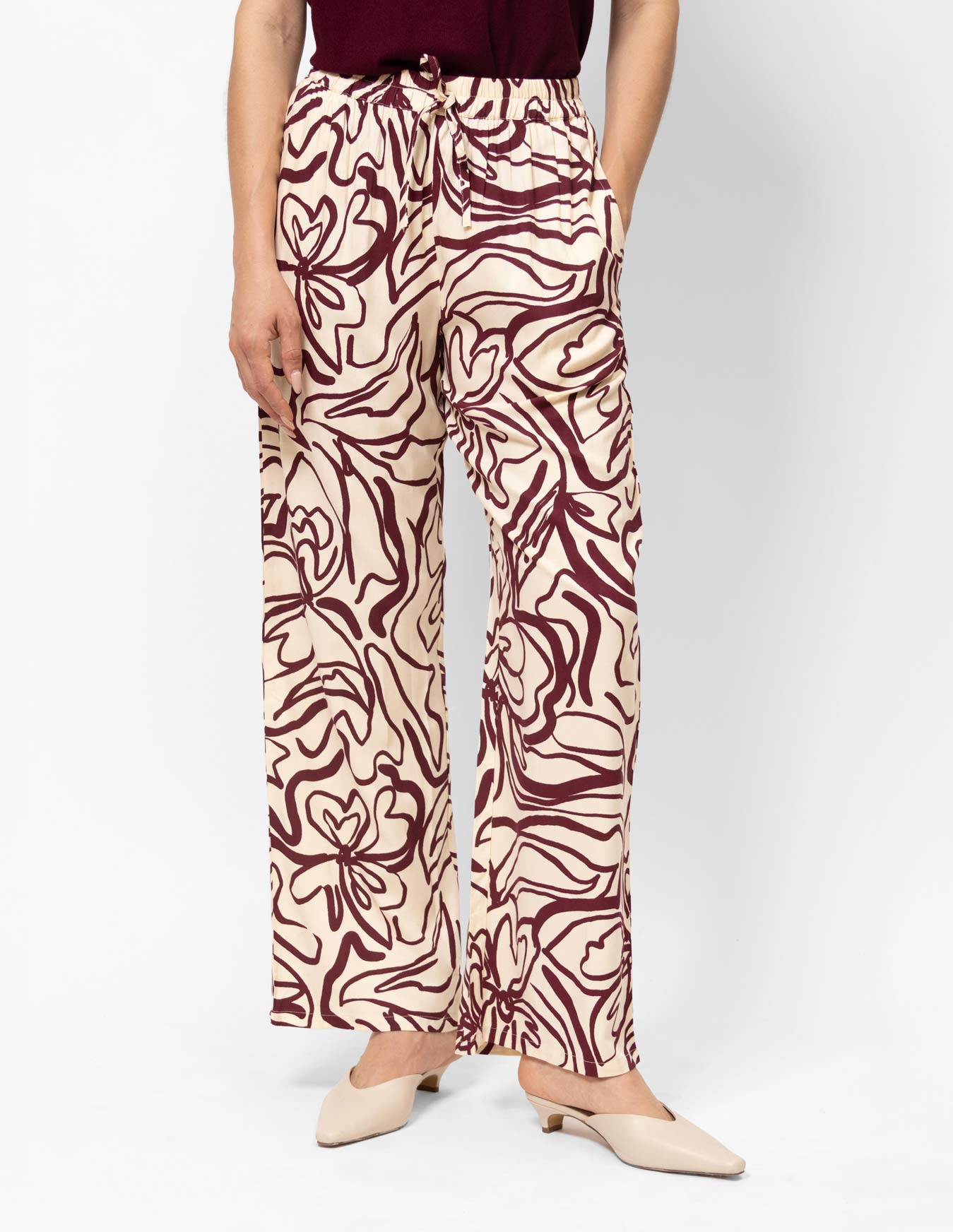 Pantalón estampado bolsillos y elástico