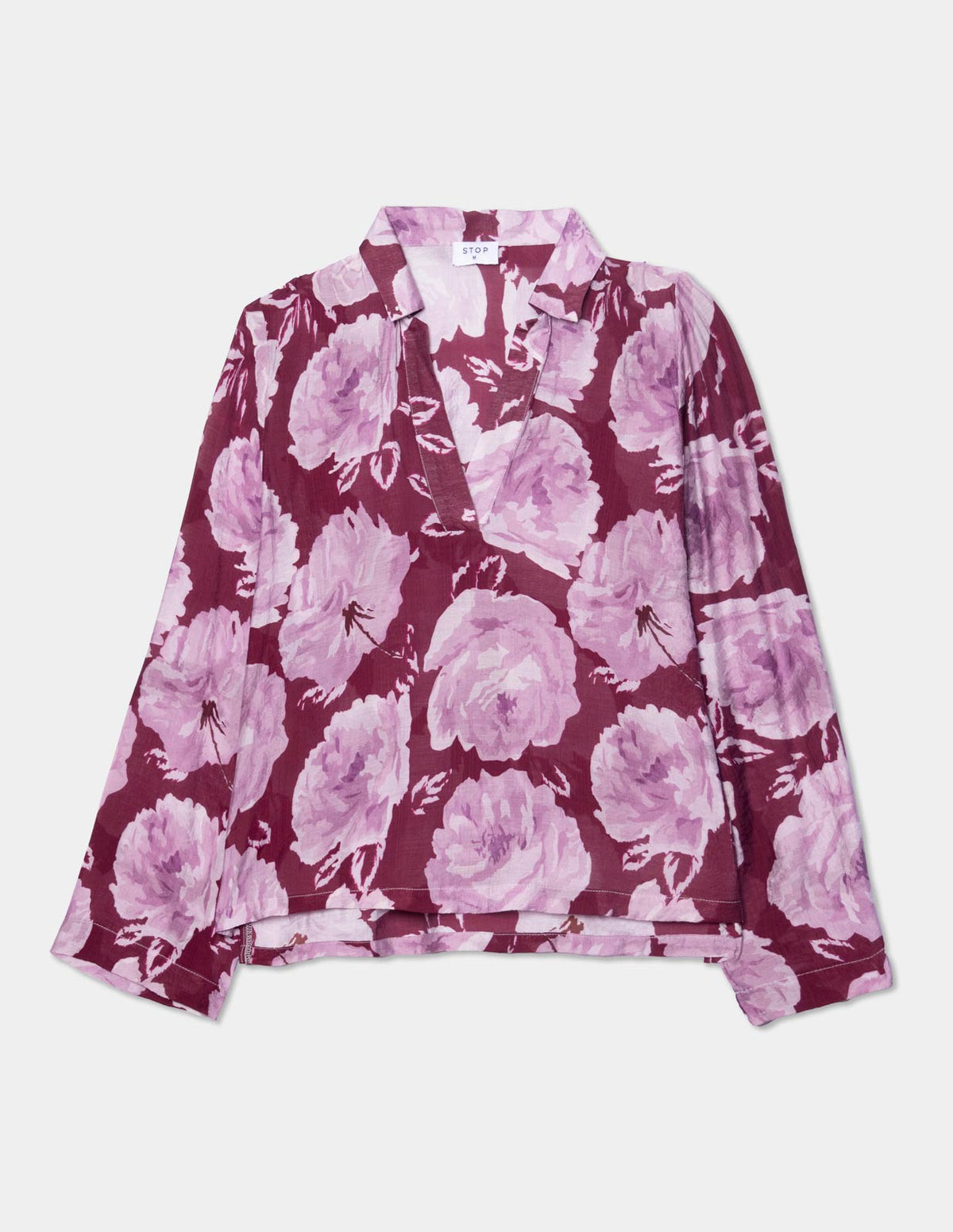 Blusa manga larga estampada con aletilla