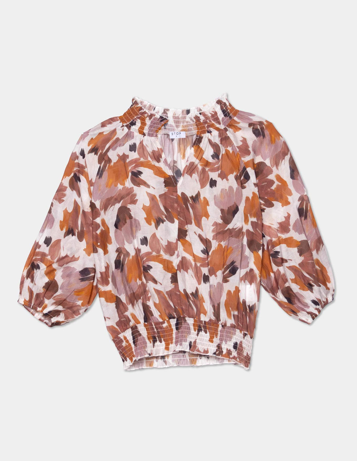 Blusa manga 3/4 con smock en cintura y puños