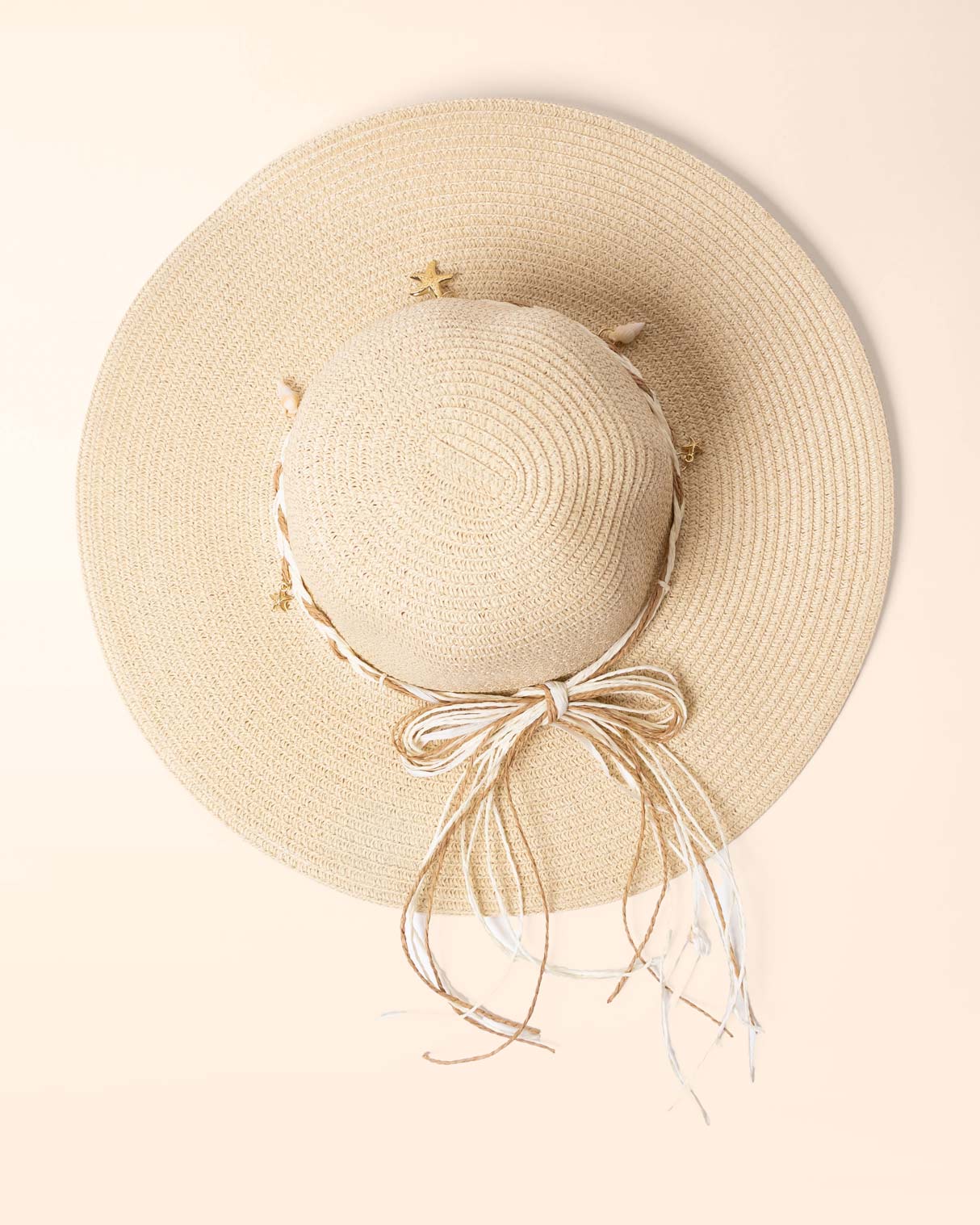 Sombrero beige conchas