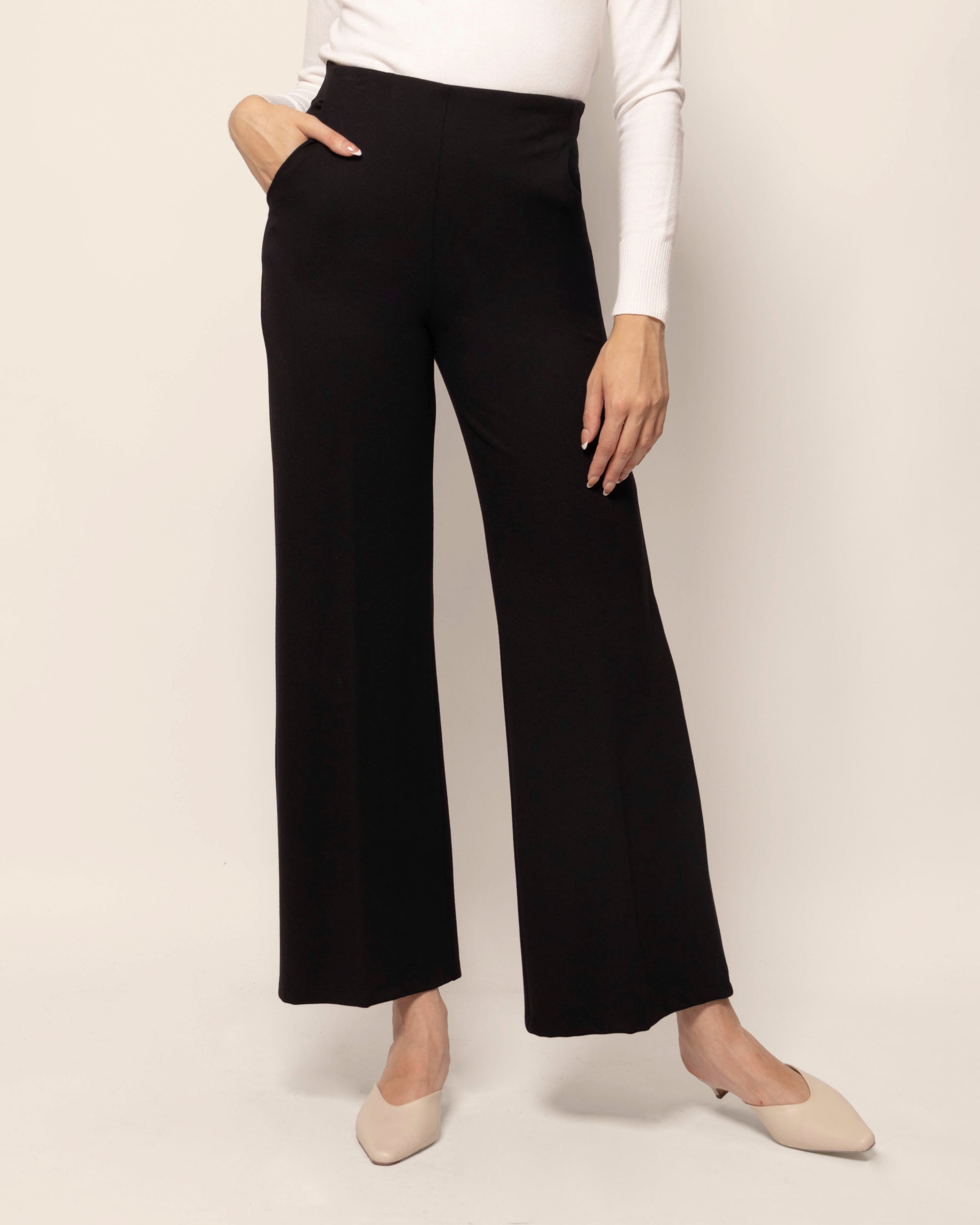 Pantalón pierna amplia bolsillos