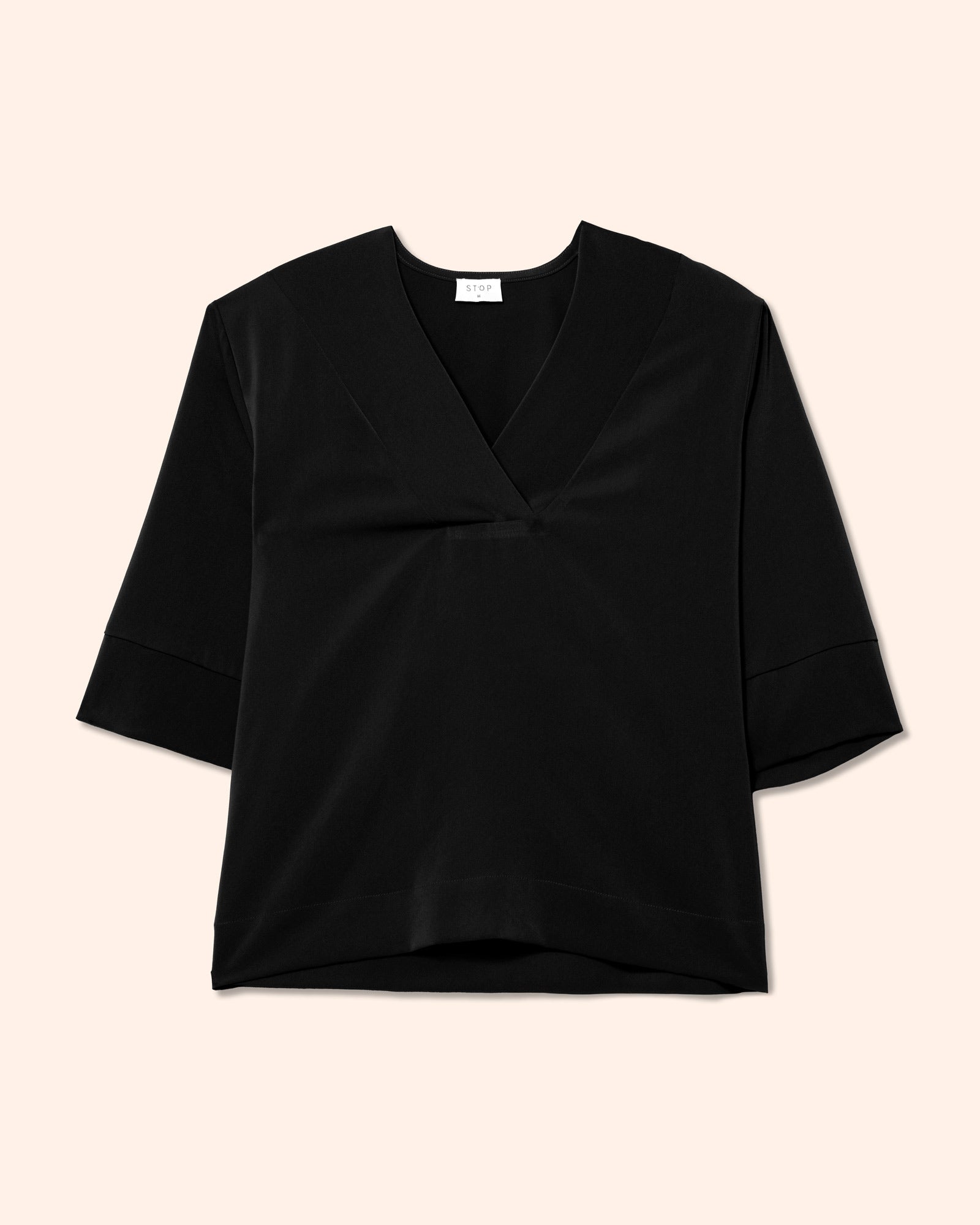 Blusa escote en V con aletilla ancha, manga 3/4